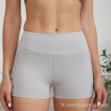 Couvrage des femmes pantalons courts de fitness pour femmes